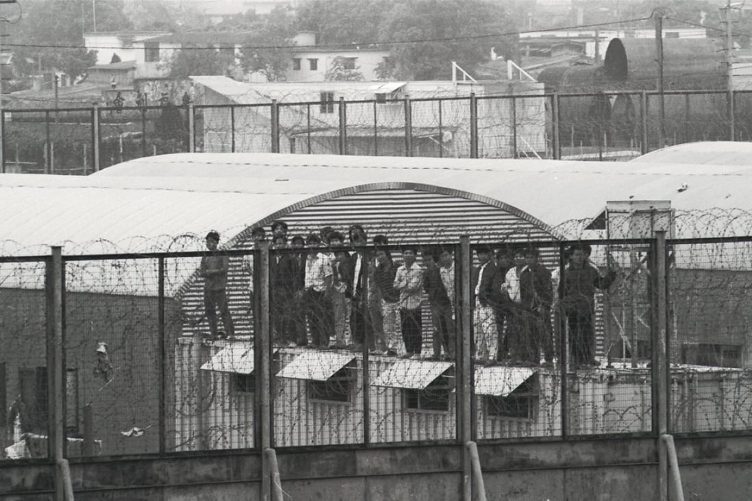 A group of Vietnamese boatpeople on a hut in the Sek Kong Detention camp after a fire killed 24 in 1992. Picture: SCMP