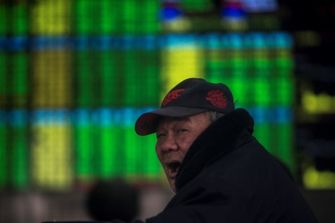 An investor in Shanghai. Photo: AFP