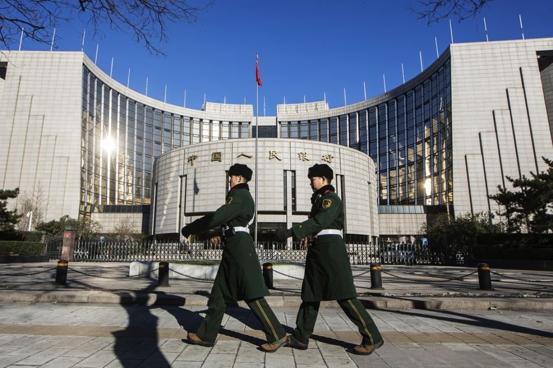 According to data from the People’s Bank of China, financial institutions had 102 trillion yuan worth of assets under management at the end of 2016. Should a small percentage of these assets turn sour, it could result in systemic risks. Photo: Bloomberg