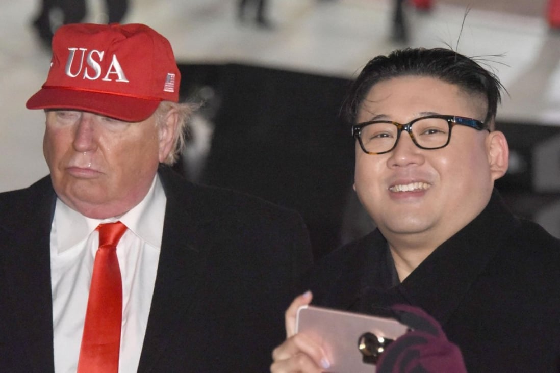 Men resembling US President Donald Trump and North Korean leader Kim Jong-un appear at the opening ceremony of the Pyeongchang Winter Olympics in South Korea on Friday. Photo: Kyodo
