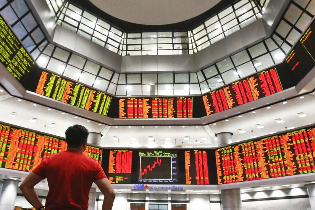 A private stock market gallery in Kuala Lumpur, Malaysia. Photo: AP