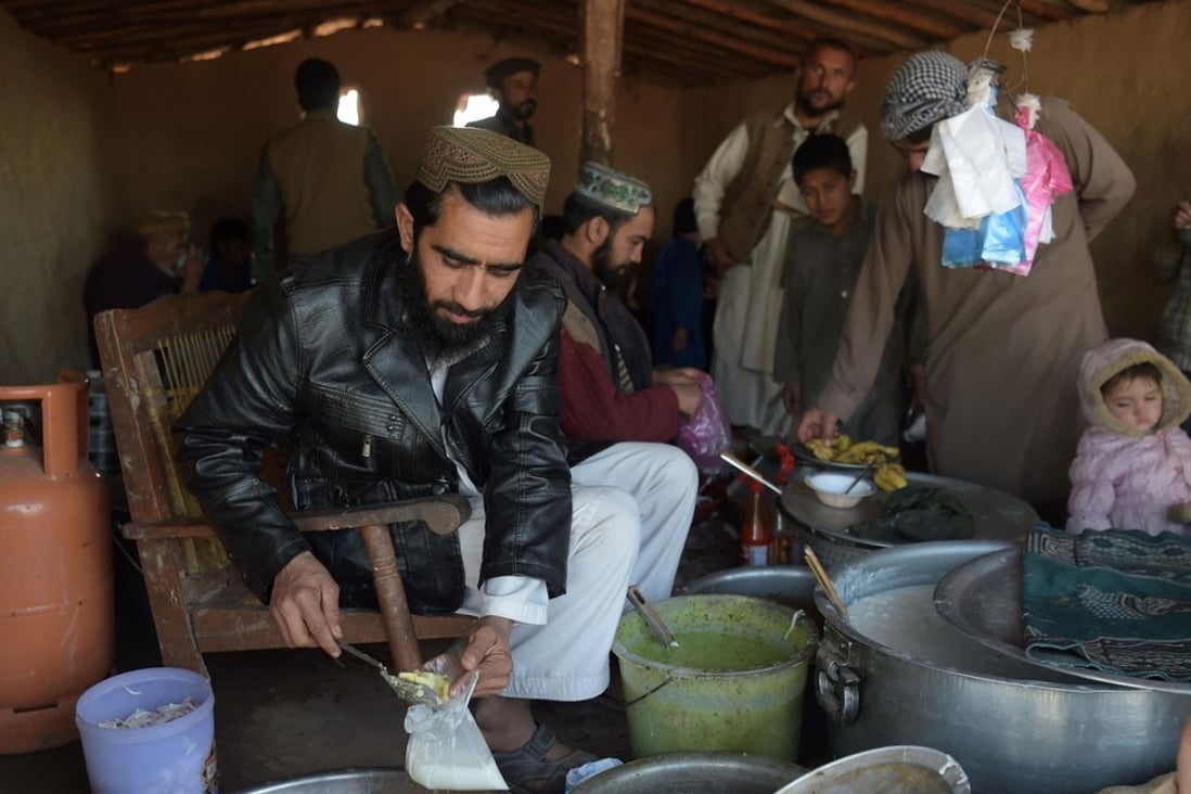 In this picture taken on January 19, 2018, an Afghan refugee vendor serves food at a refugee camp in Pakistan's capital Islamabad. The UN said ways must be found to deal with the demands of war zones. Photo: AFP