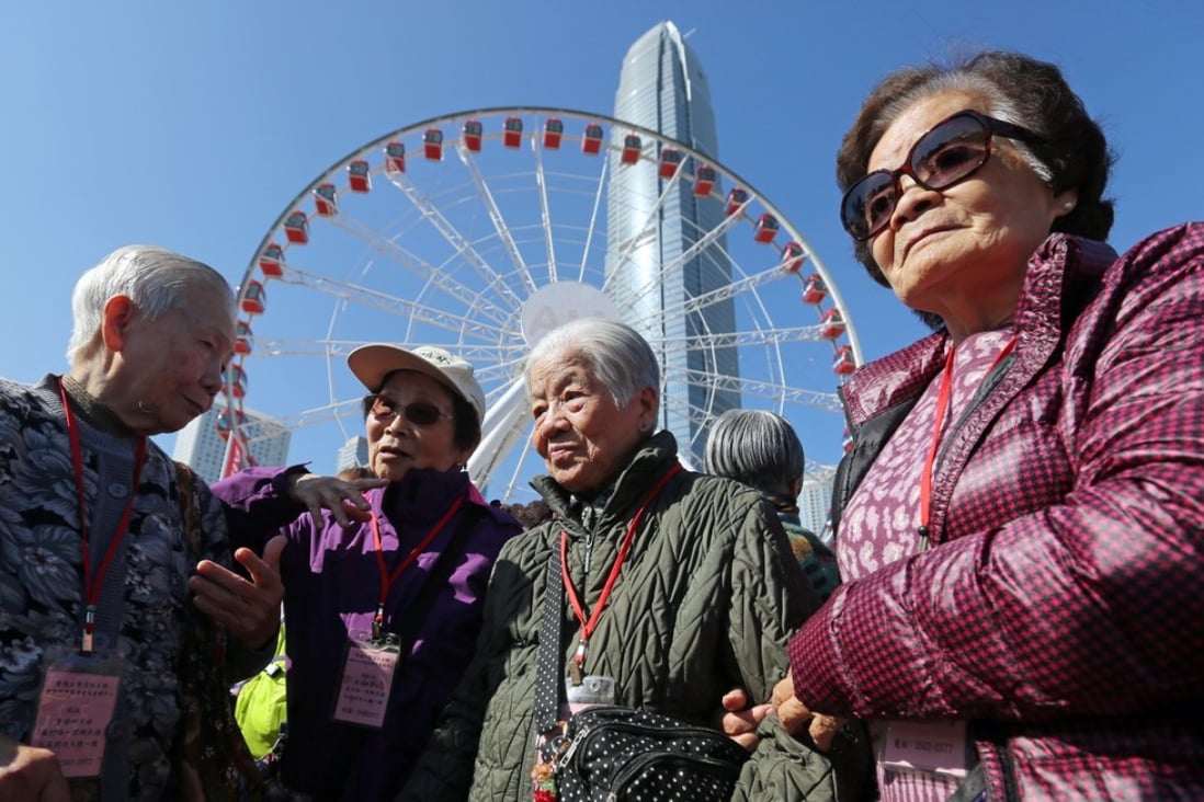 (Left to right) Chiu Wai-chan, Choi Sau-ming, Chow Fuk-far, and Li Au-ying get ready for a ride at the Observation Wheel in Central in December. Social relationships are important to keep us mentally healthy. Photo: Xiaomei Chen