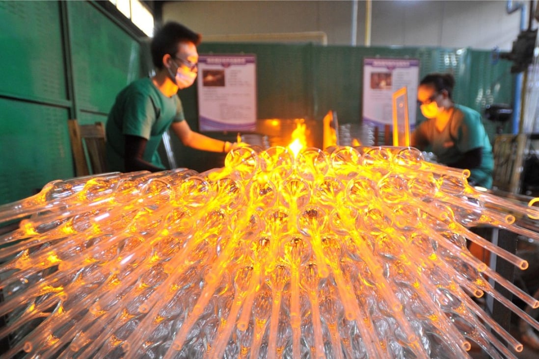 Beijing has banned capacity expansion in the glassmaking and cement industries this year. Photo: Xinhua
