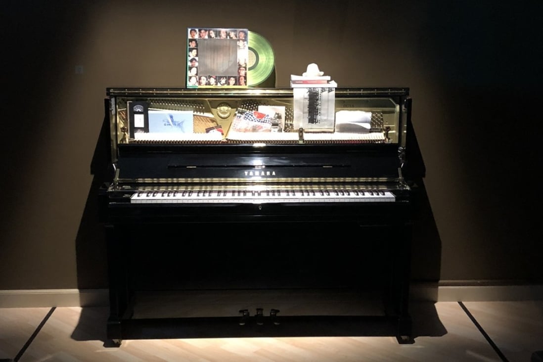 A self-playing piano with its hammers muted by a collection of different objects plays in one of the exhibition’s rooms. Photo: Enid Tsui