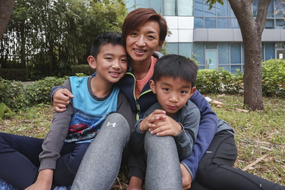 Javis Leung; his mother Lena Tsang and brother Daniel Leung. Photo: Jonathan Wong