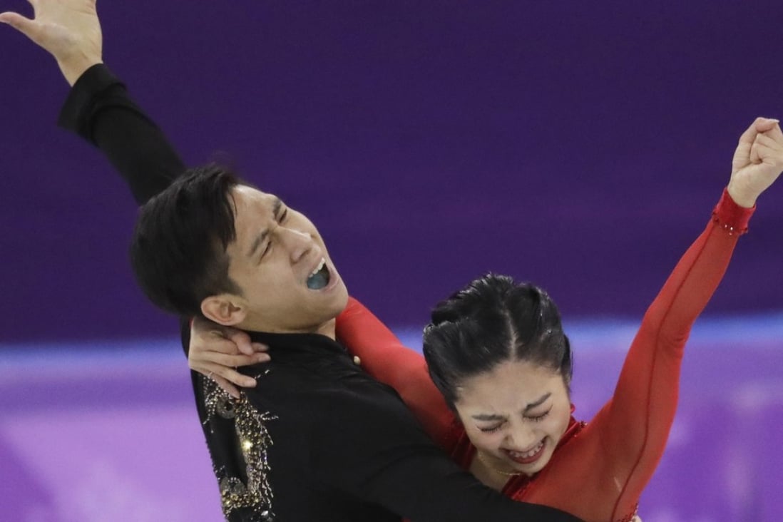 China’s Sui Wenjing (right) and Han Cong after their free skate routine. Photo: AP