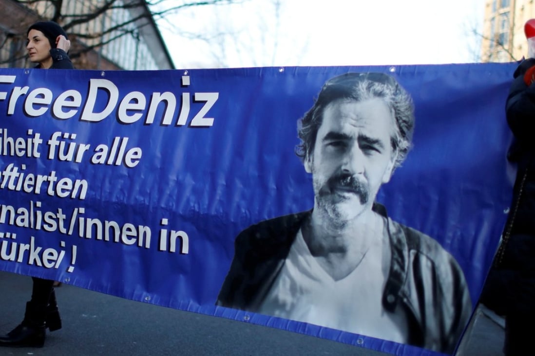 Protesters support arrested German-Turkish journalist Deniz Yucel in Berlin, Germany. Photo: Reuters
