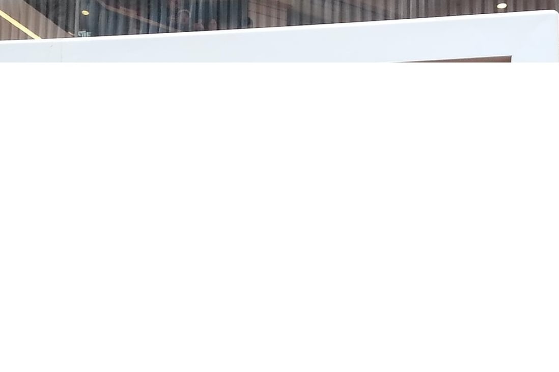 Thomas Lam Tat-man, the general manager of the Number One sales department of Henderson Property Agency, a unit of Henderson Land Development, during a Lunar New Year celebration event in Tsim Sha Tsui on Friday. Photo: Eric Ng