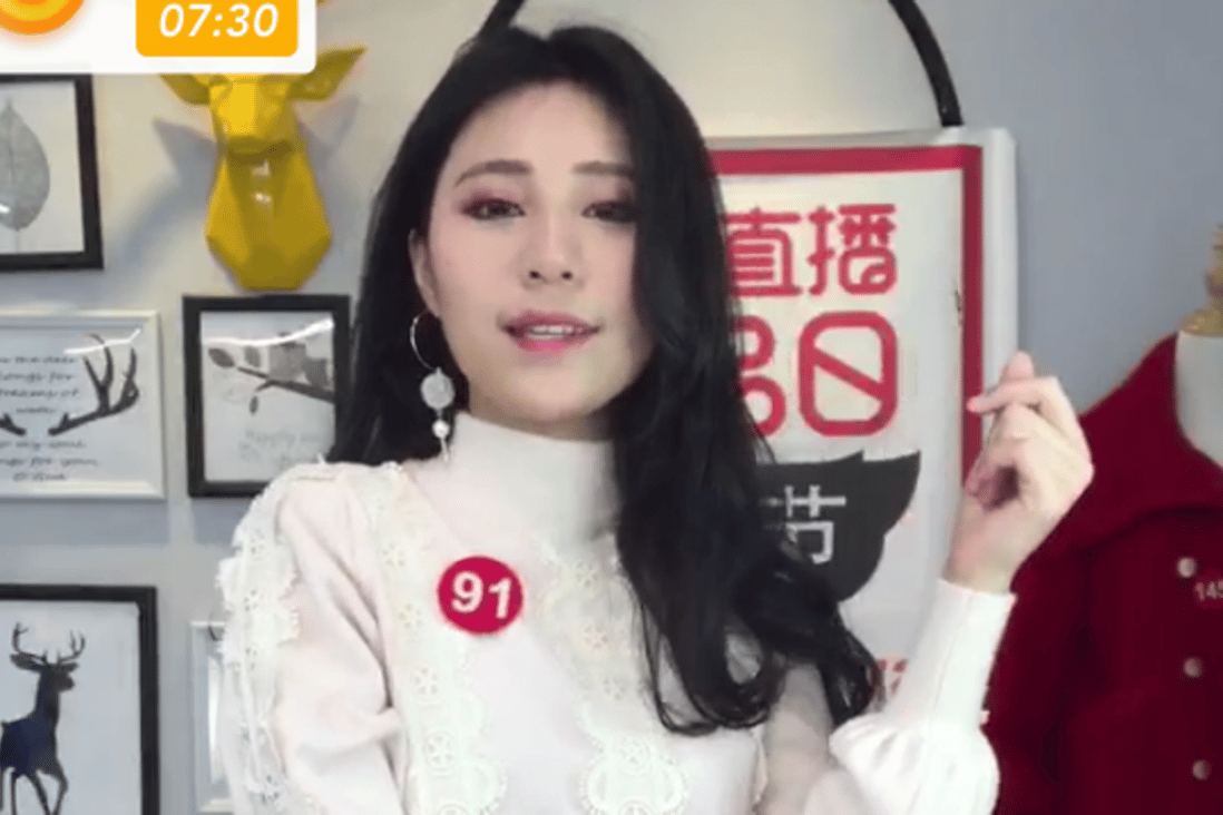 Taobao Live celebrity Eva Nange’er promotes a red coat for viewers. Photo: Handout