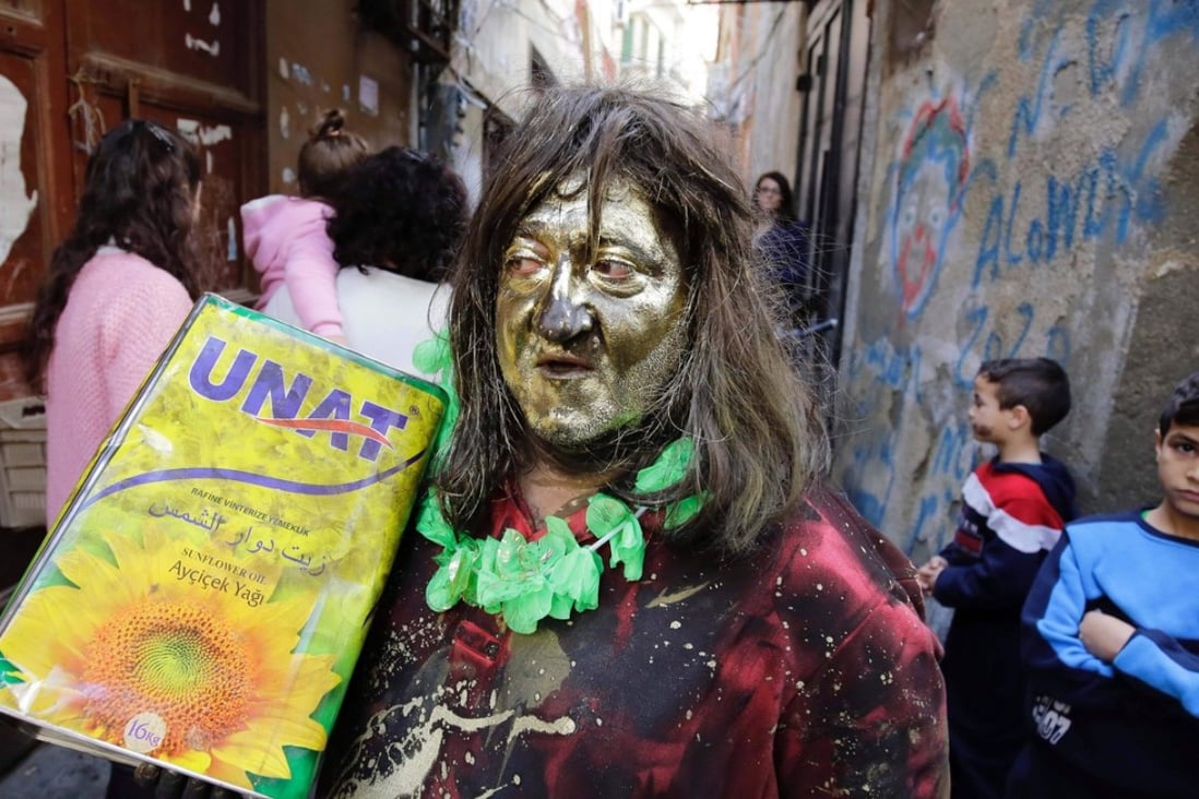 A Lebanese man takes part in the Zambo carnival held in the northern Lebanese city of Tripoli on Sunday. Photo: Agence France-Presse
