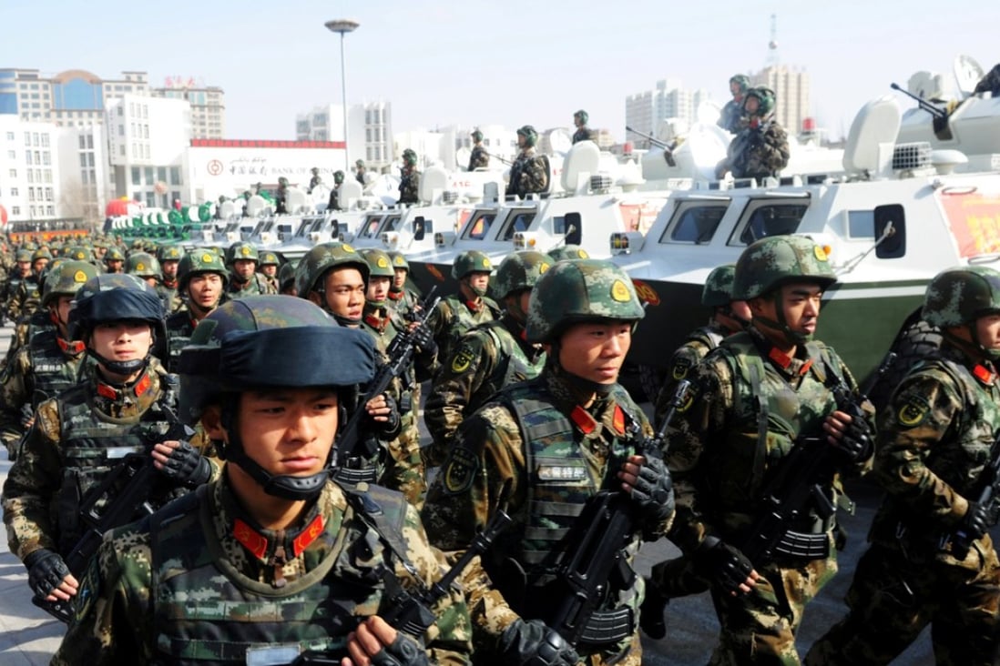 Paramilitary police take part in a counterterrorism rally, in Kashgar, Xinjiang. Photo: Reuters