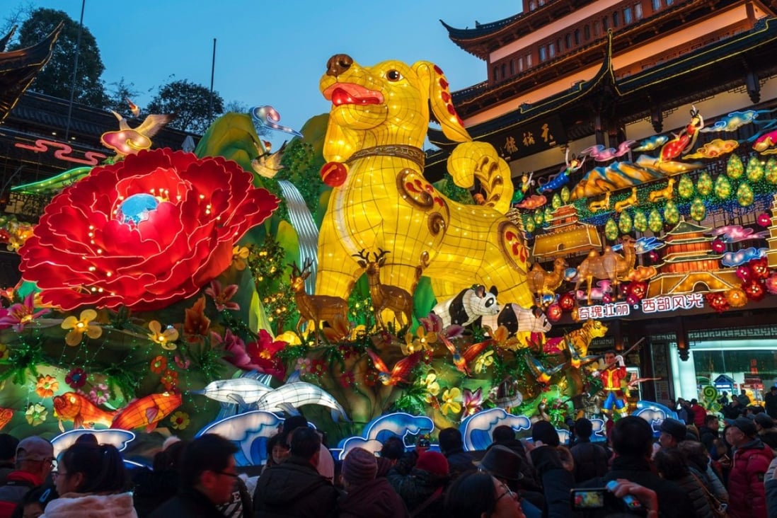 Chinese employees are awarded the least year-end bonuses in three years since 2015, just before the Year of the Dog begins. Photo: AFP