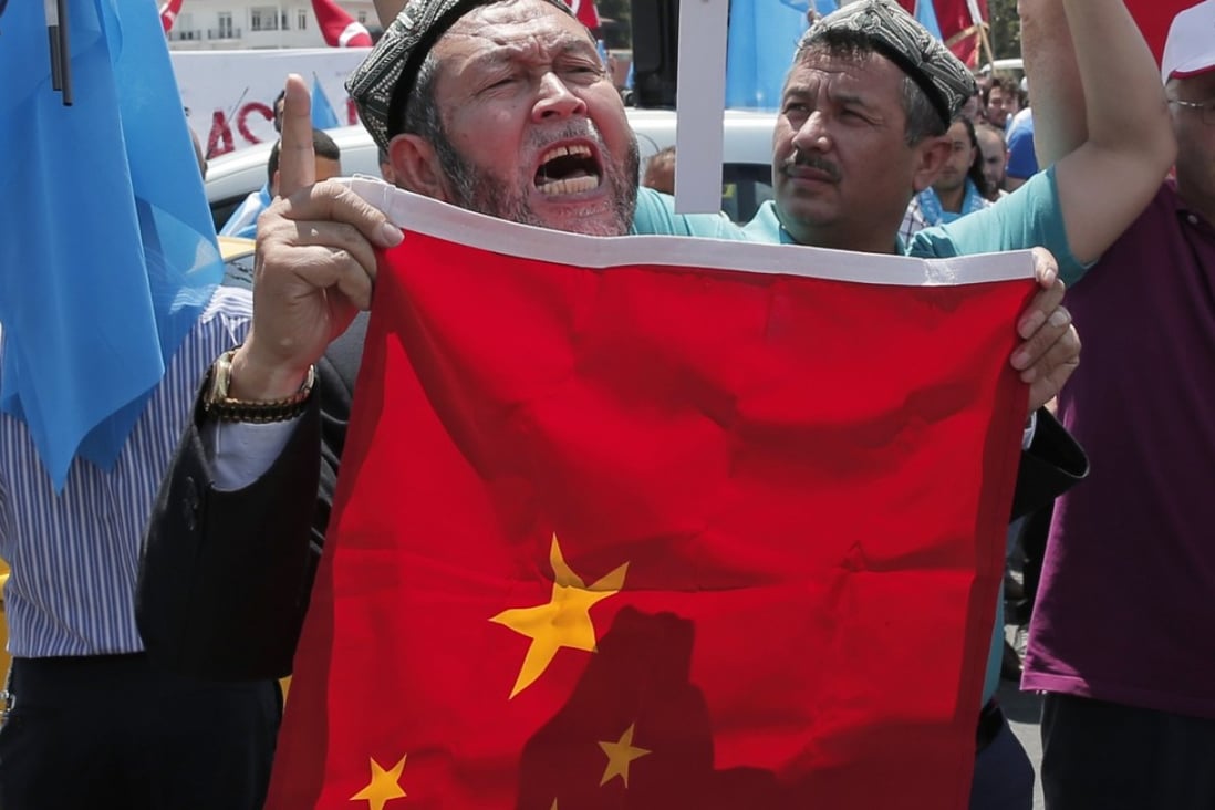 Uygurs in Turkey protest near China's consulate in Istanbul. File photo