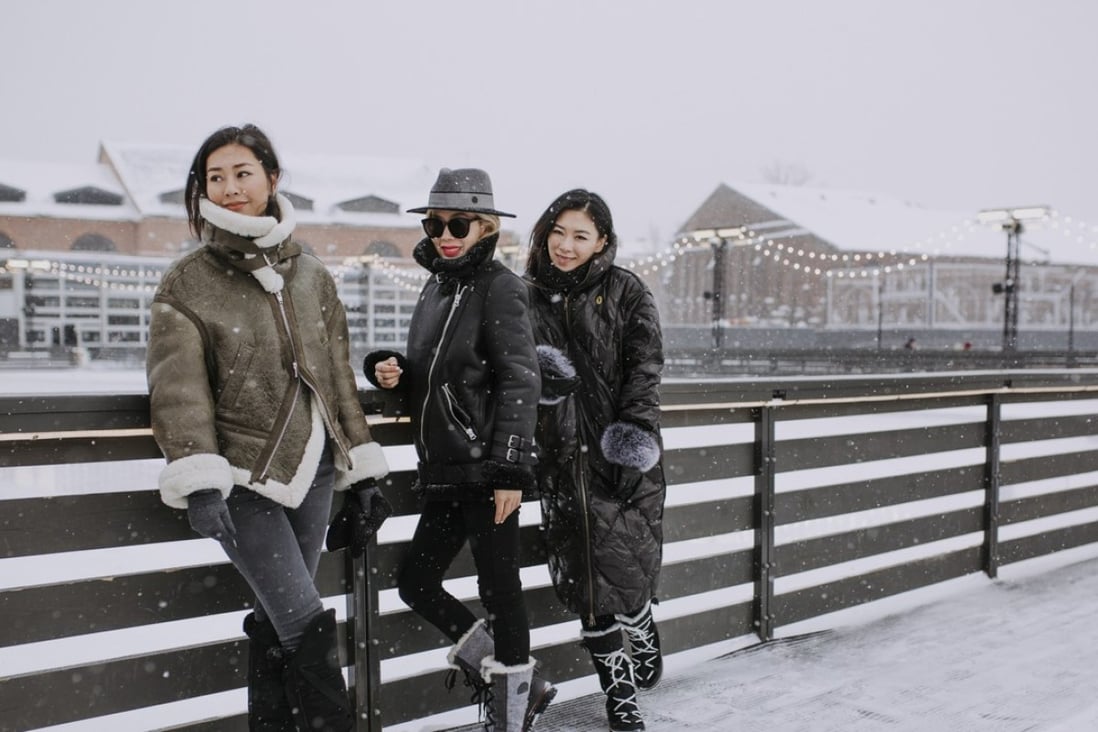 Friends Maggie Xu (centre), Yuki Dong (left) and Jenny Lu in St Petersburg. Photo: Kristina Averina