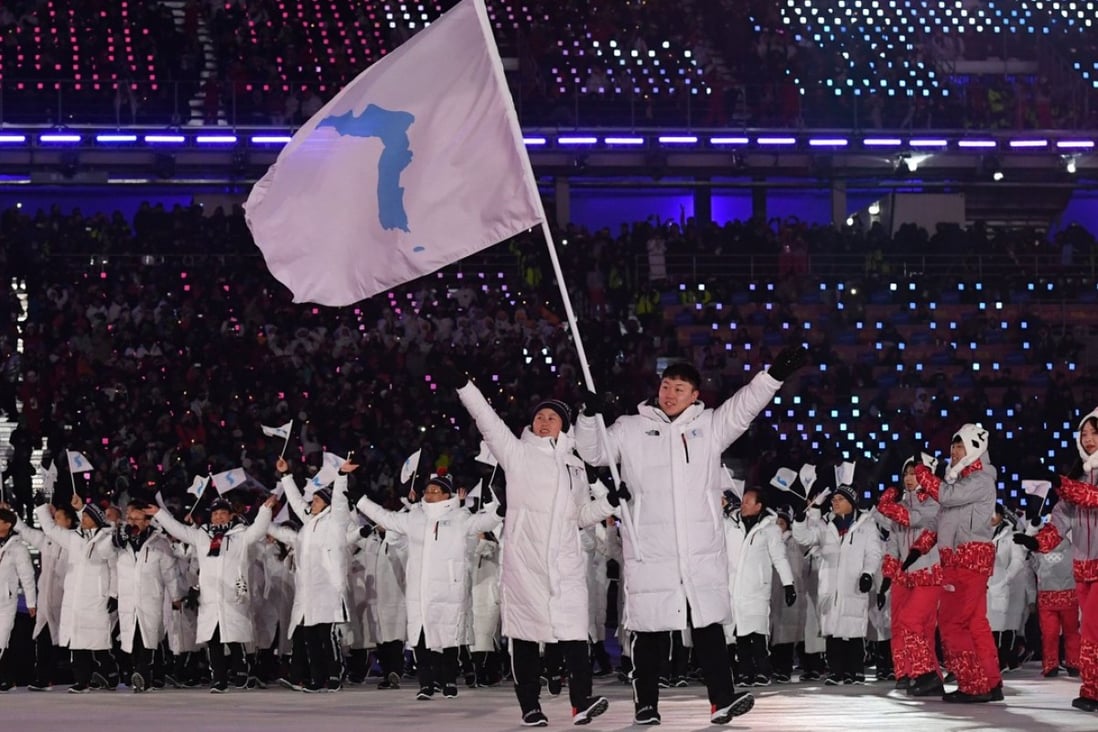 The North and South Korean teams march under the one-Korea flag at the opening ceremony of the Pyeongchang Olympics. Photo: AFP