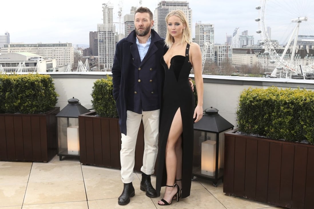 Jennifer Lawrence and co-star Joel Edgerton pose for photographers at a photo call for their film Red Sparrow in London. Photo: AP