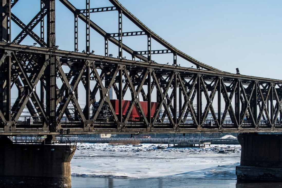 A truck crossing the Friendship Bridge from the North Korean town of Sinuiju to the Chinese border city of Dandong last month. China’s January trade with North Korea fell to the lowest level since at least June 2014. Photo: AFP