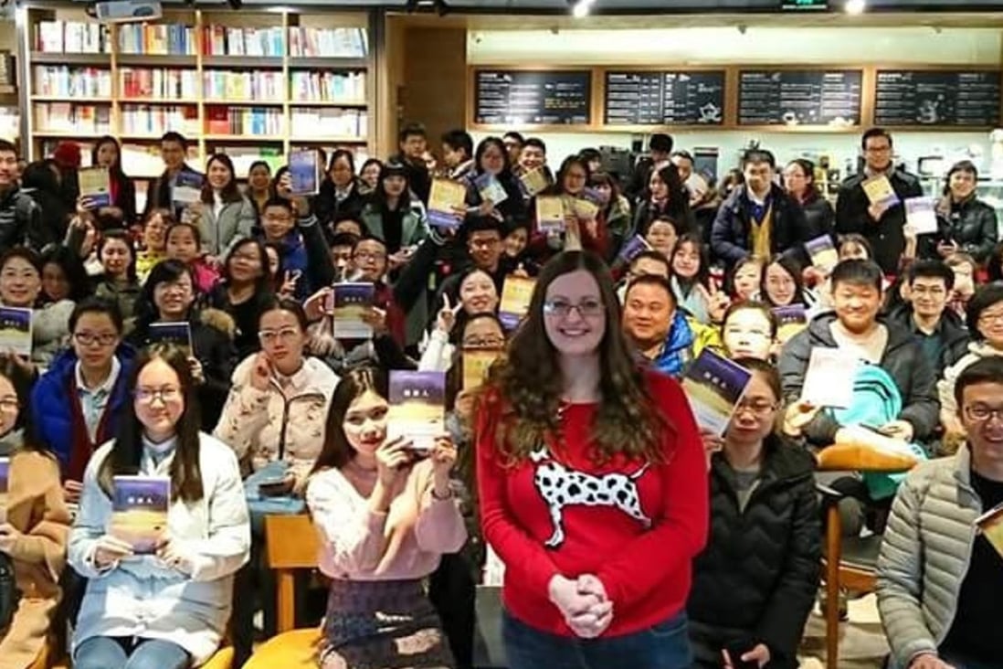 Scottish author Claire McFall attends a book signing in Beijing.
