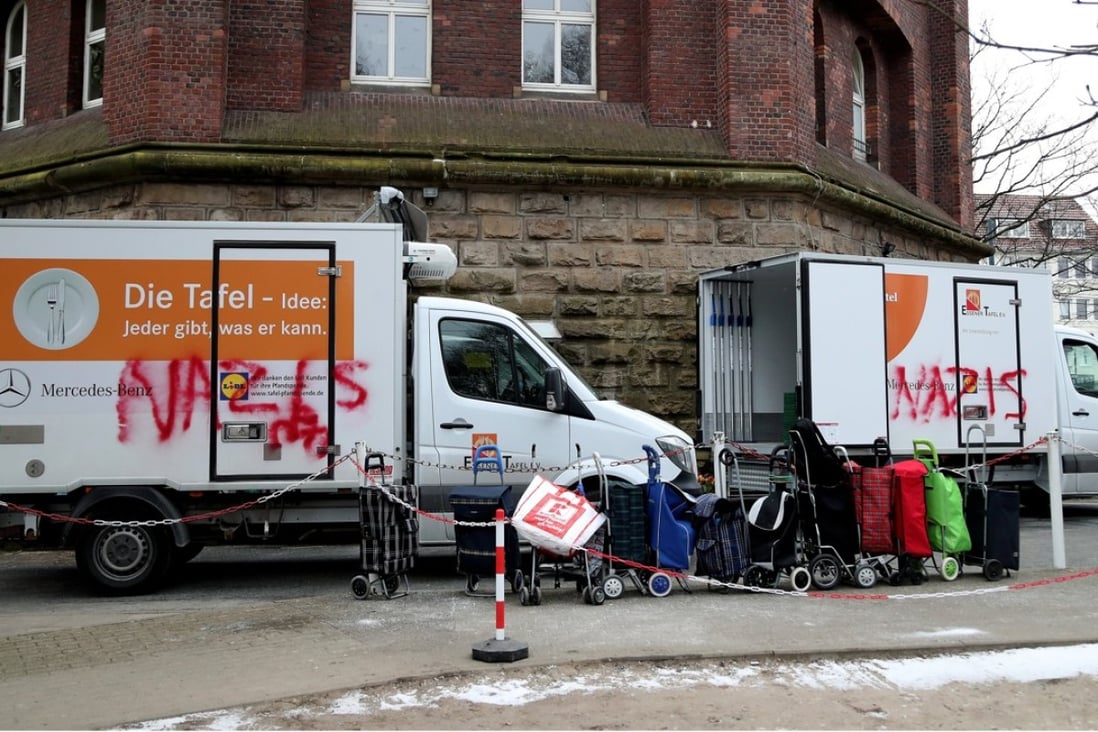Vandalised vehicles delivering food at the Tafel in Essen, Germany. Photo: EPA