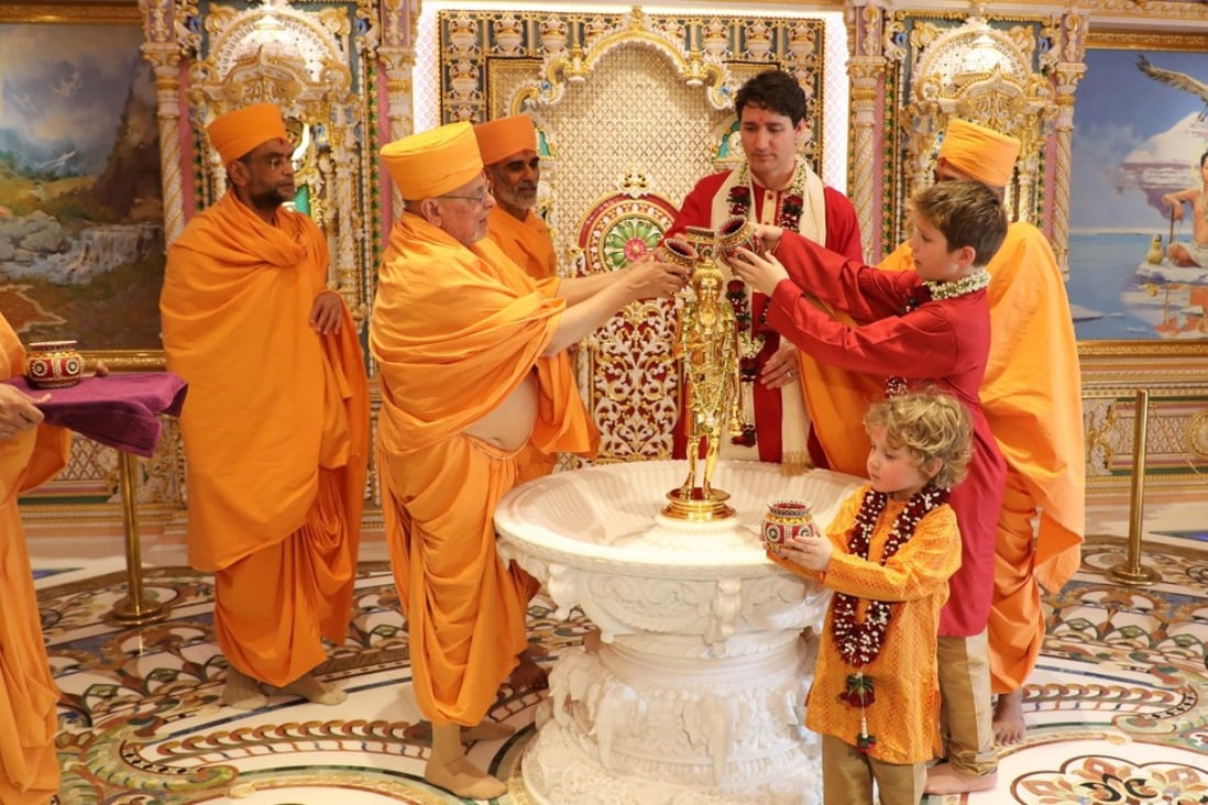 Canadian Prime Minister Justin Trudeau and his sons visit a temple in the Indian town of Gandhinagar. Photo: AFP