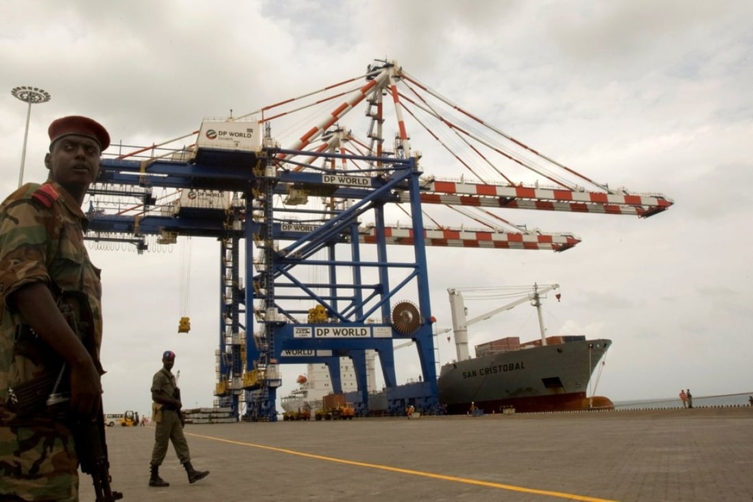 A Djibouti policeman stands guard during the opening ceremony of the Doraleh container terminal in Djibouti on February 7, 2009. The Dubai-based operators say they have been unfairly ousted by officials in Djibouti, and that the port will be turned over to China. Photo: Reuters