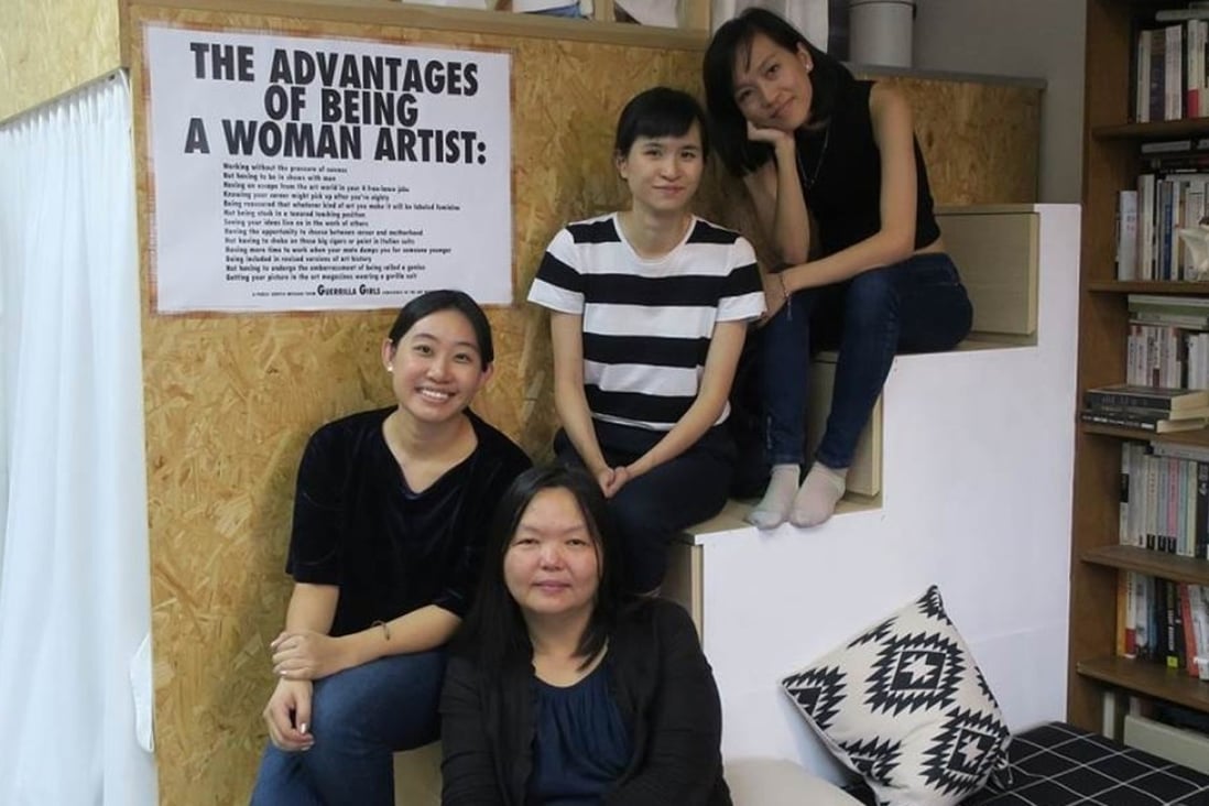 Asia Art Archive’s Phoebe Wong (front) with artists (from left) Ho Sin-tung, Ko Sin-tung, and Elva Lai at Ho's studio. Photo: Peter Bird