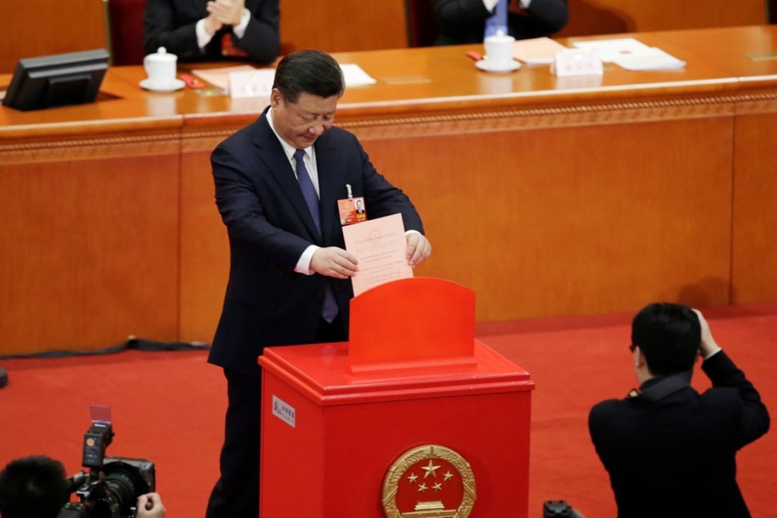 President Xi Jinping casts his ballot in Beijing on Sunday in a vote on constitutional revisions that removed the presidential term limit, among other changes. Photo: Reuters