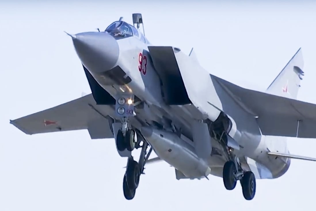 A MiG-31 fighter jet of the Russian air force carrying the new Kinzhal hypersonic missile takes off from an air base in southern Russia. The Russian military says it has run a successful test of the Kinzhal missile. Photo: AP/Russian Defense Ministry Press Service