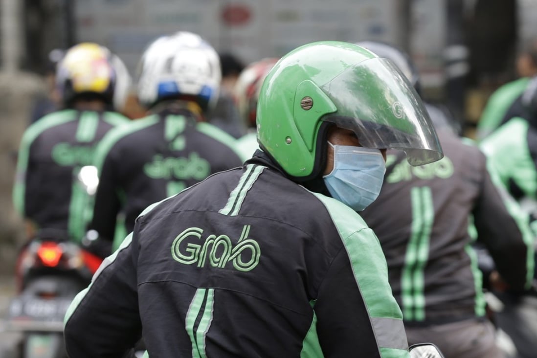 Grab Financial Services Asia, a new joint venture between ride-hailing firm Grab and Japanese credit card company Credit Saison Co, will offer micro-financing products in Southeast Asia. Photo: AP