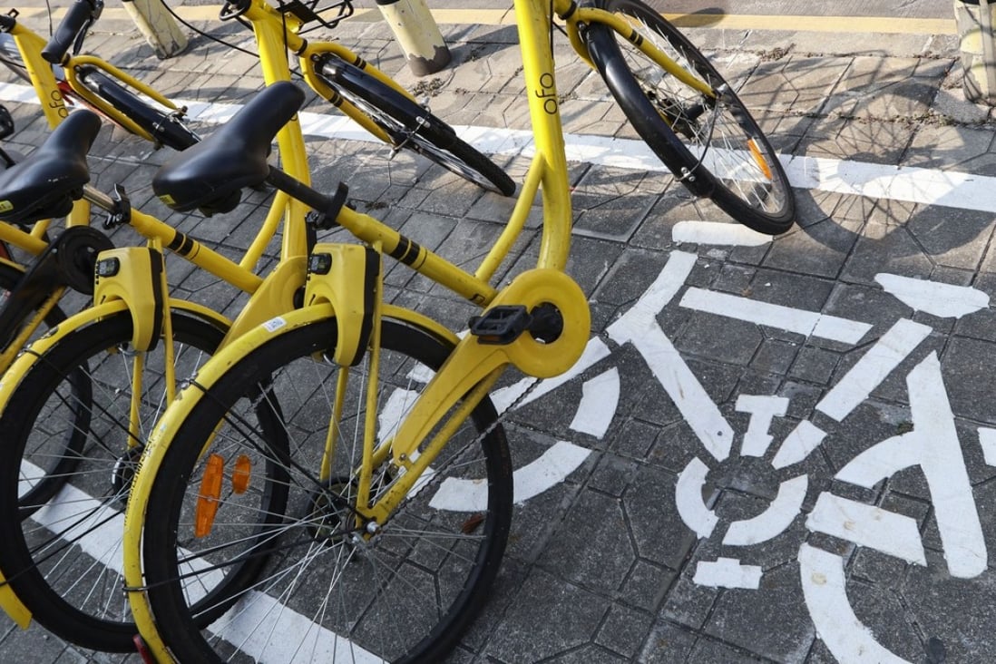 Ofo bicycles are seen parked on the street in the Futian district of Shenzhen. Photo: Roy Issa