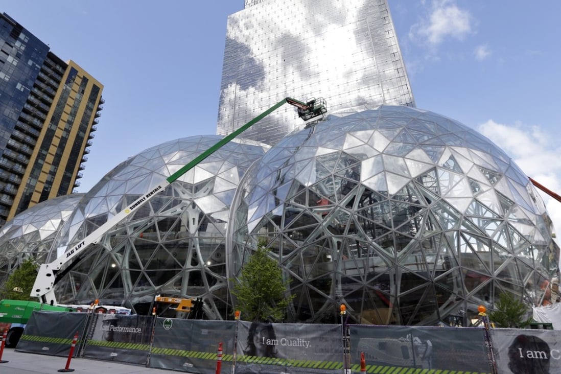 Amazon continues to drive the Seattle office market, as it looks to add several million square feet through the next few years. Photo: AP