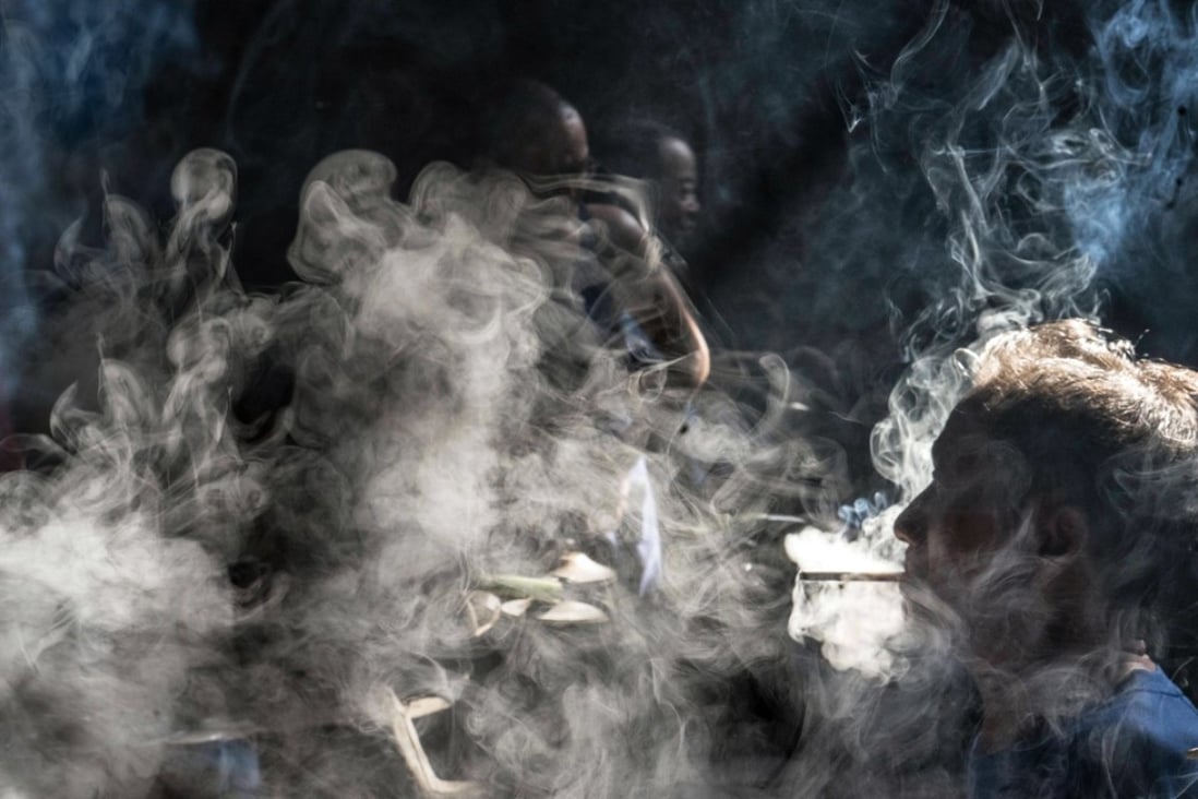 Some 27 per cent of the population smokes in China, versus the global average of 22 per cent. Photo: EPA