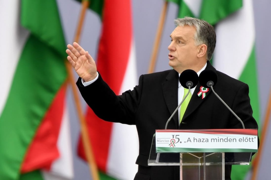 Hungarian Prime Minister Viktor Orban delivers a speech in front of the Hungarian Parliament in Budapest. Photo: AP