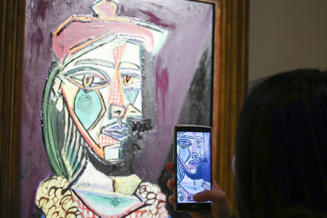 Pablo Picasso’s ‘Femme au béret et à la robe quadrillée (Marie-Thérèse Walter)’ at Sotheby's in Hong Kong. People looking to buy art want to go online for the transparency, says Brian Shipman, chief information officer at Heritage Auctions. Photo: Nora Tam