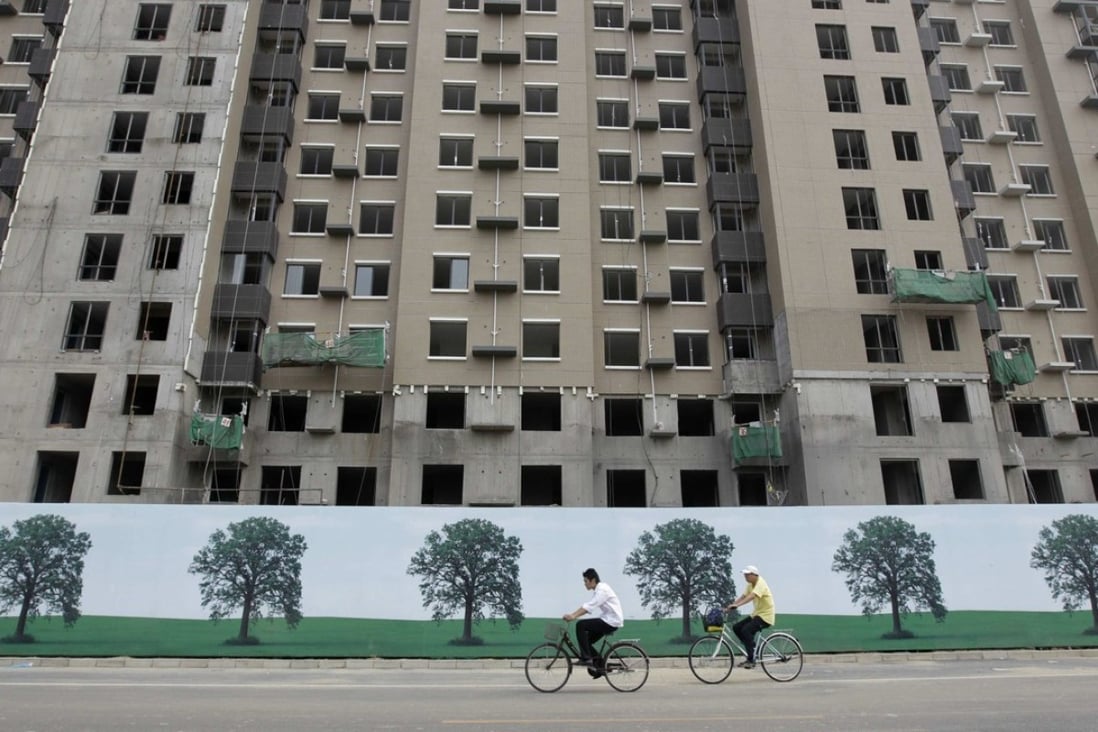 Residential blocks under construction in Beijing. Some Chinese cities continue to roll out fresh property tightening steps as housing prices remain restrictively high for many buyers. Photo: Reuters