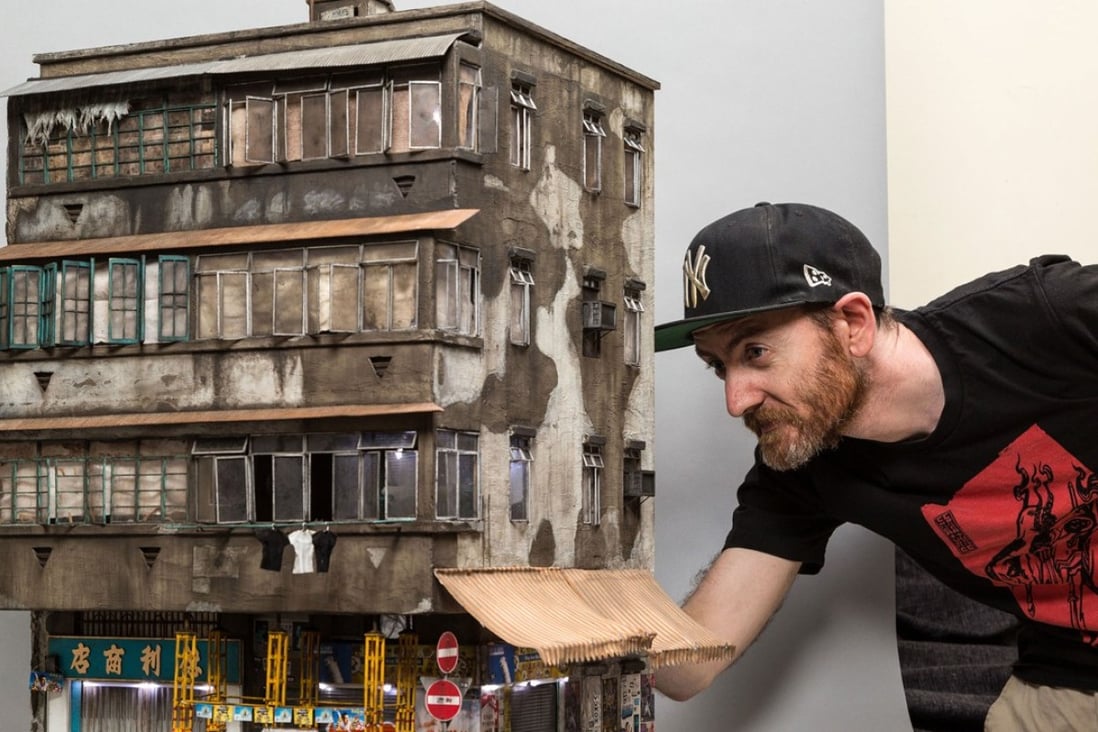 Joshua Smith and his model of 23 Temple Street, Hong Kong made without ever seeing the building. Photo: Andrew Beveridge/ASBcreative.com