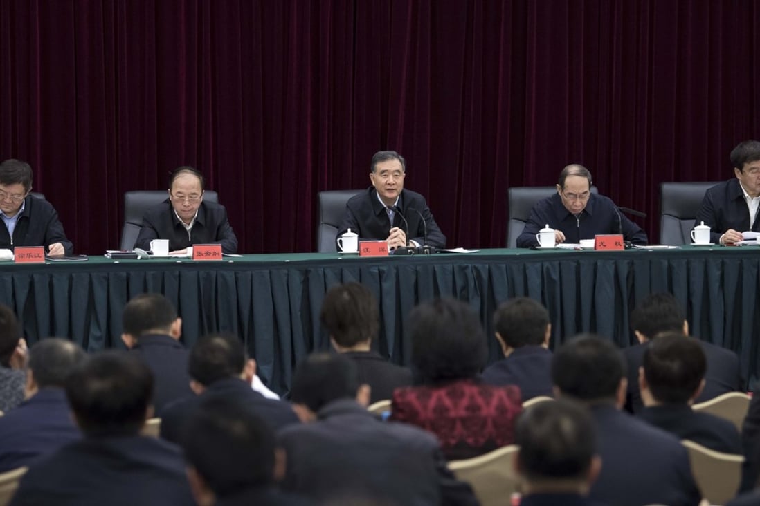 Vice-Premier Wang Yang (centre) speaks at a meeting of the United Front Work Department leadership in January. Photo: Xinhua