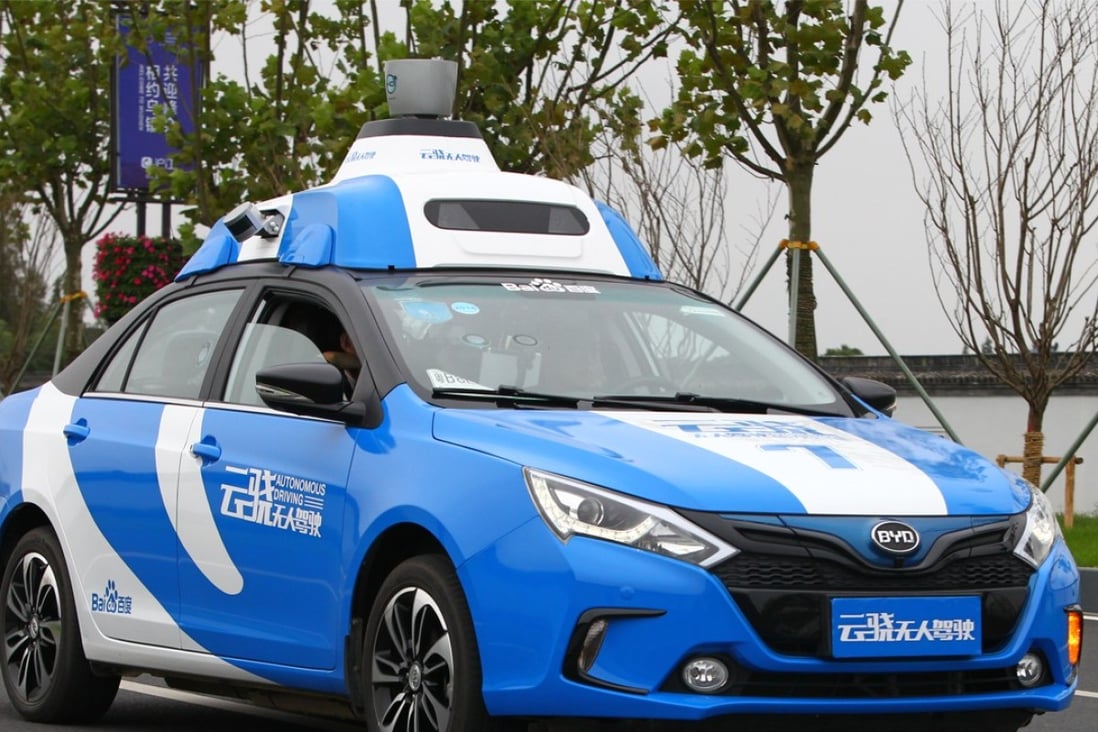 People take test ride of a Baidu driverless car. Photo: SCMP 