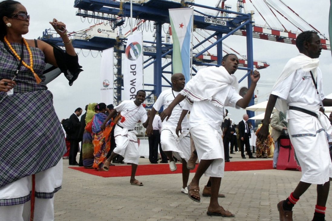 Performers dance during the opening ceremony of Dubai-based port operator DP World’s Doraleh container terminal in Djibouti port. Djibouti’s president has been criticised for seizing control of the terminal, reportedly to allow China to take it over. China has been investing heavily in the African port nation and set up a naval base there. Photo: AP