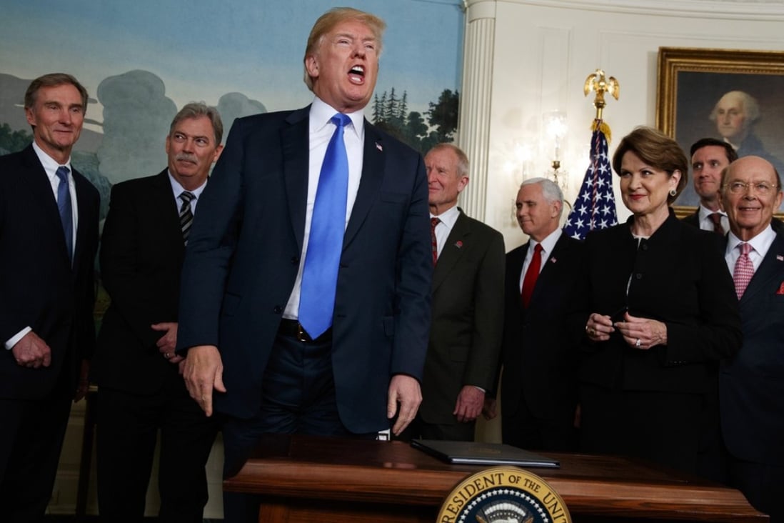 President Donald Trump speaks after he signed a presidential memorandum imposing tariffs and investment restrictions on China. Photo: AP