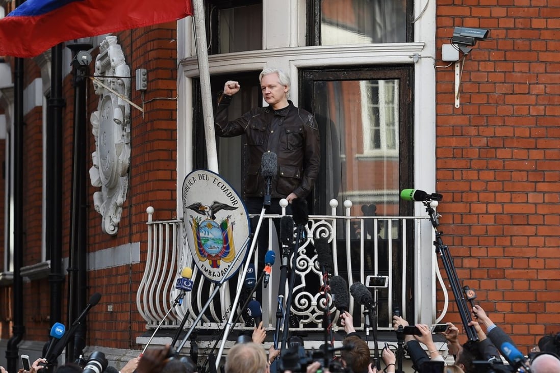 Julian Assange speaks to the media from the balcony of the Ecuadorean embassy in London on May 19, 2017. Ecuador announced on March 28, 2018 it has cut off his communications after violating some of the terms of his stay in the embassy. Photo: EPA-EFE