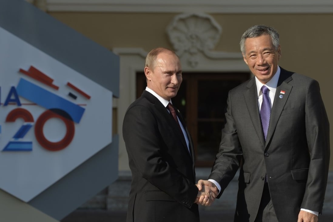 Russian President Vladimir Putin with Singapore’s Prime Minister Lee Hsien Loong. Putin has reorientated his country’s foreign policy towards Asia. Photo: AFP