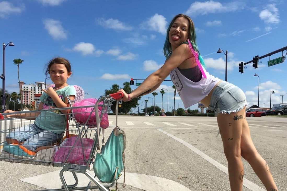 Bria Vinaite (right) and Brooklynn Prince as mother and daughter in a still from The Florida Project (category IIB), directed by Sean Baker. Willen Dafoe co-stars.