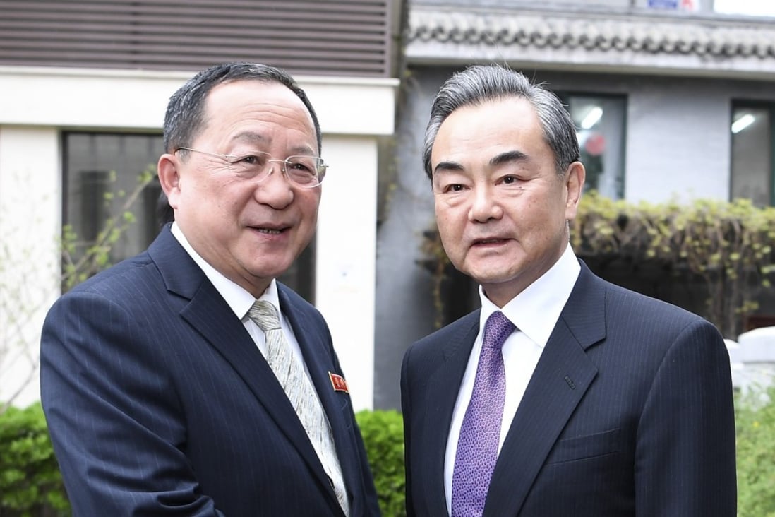 China’s Foreign Minister Wang Yi (right) pictured with his North Korean counterpart, Ri Yong -ho, in Beijing. Photo: Xinhua