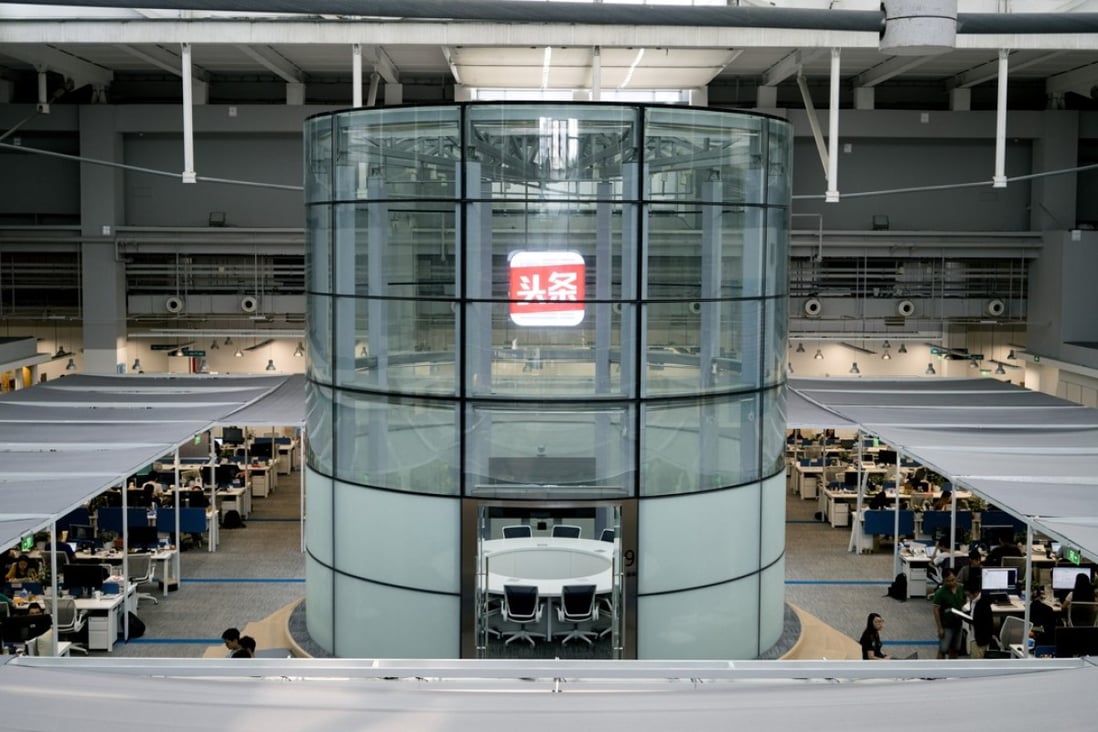 The logo for the Jinri Toutiao mobile app is displayed inside the company's headquarters in Beijing. Photo: Bloomberg