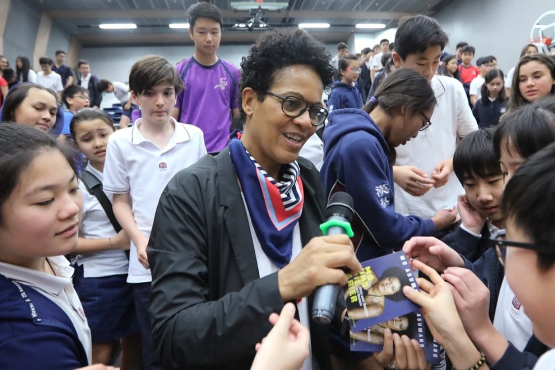 Activist, TV presenter and documentary filmmaker Mo Asumang speaks to pupils at the Chinese International School in North Point, Hong Kong. Photo: Edward Wong