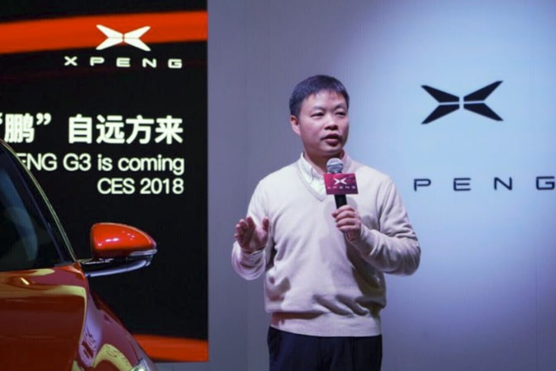 He Xiaopeng, co-founder and chairman of Xiaopeng Motors, unveils the company's first production car at the CES trade show in Las Vegas. Photo: Handout