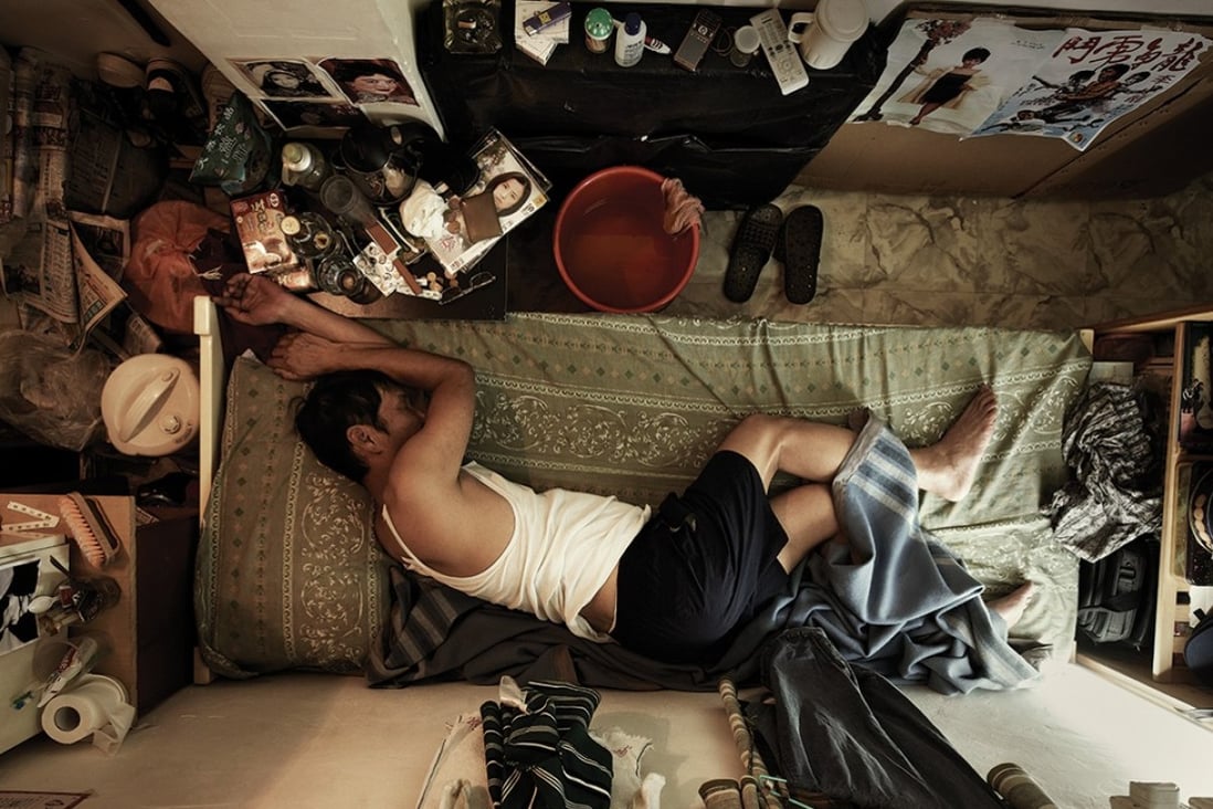 An image from a photo exhibition featuring residents of subdivided flats in Hong Kong. Photo: SoCO/ Benny Lam
