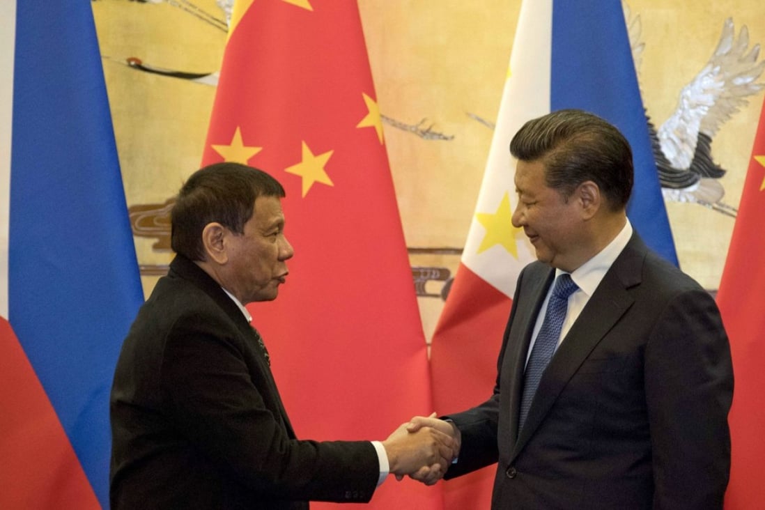 Philippine President Rodrigo Duterte (left) and Chinese President Xi Jinping shake hands after a signing ceremony in Beijing on October 20, 2016. Since taking office in 2016, Duterte has championed an “independent foreign policy” that has distanced the country from its traditional ally, the US. Photo: AFP